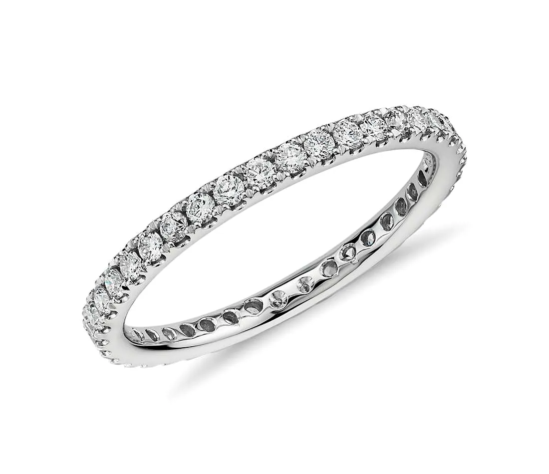 White diamond eternity band on a light background